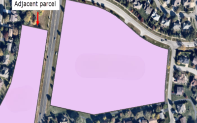 Who owns adjacent parcels?